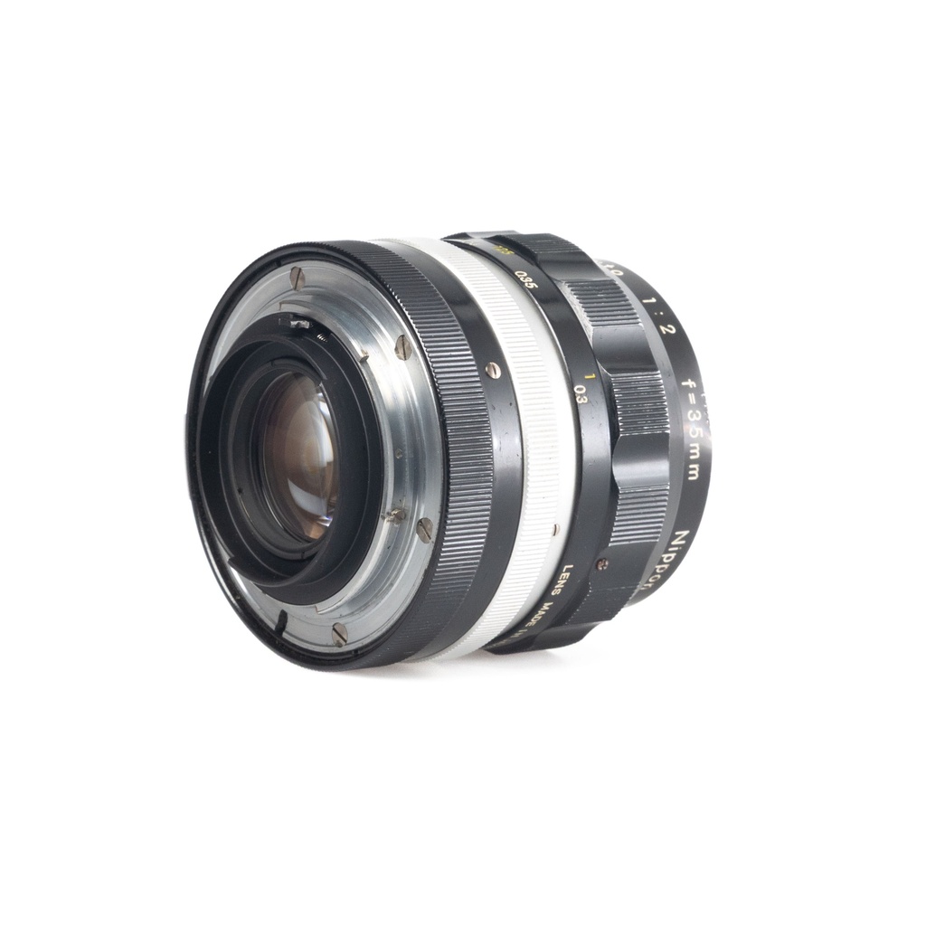 Nikon Nikkor-O Auto 35mm f/2 Pre Ai Lens w/- HN-3 Lens Hood- Grade